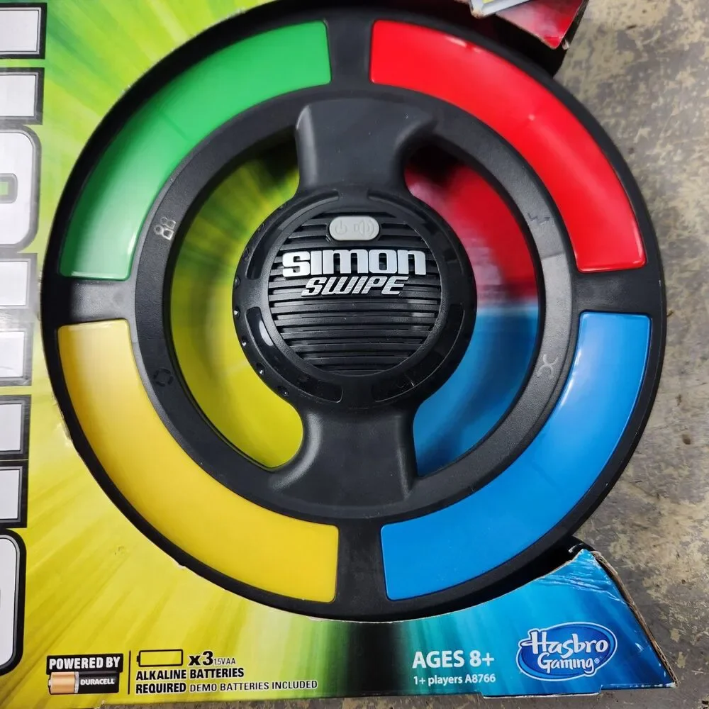 Hasbro Simon Swipe Electronic Memory Game A8766 – 4 Games, 16 Levels Ages 8+ New